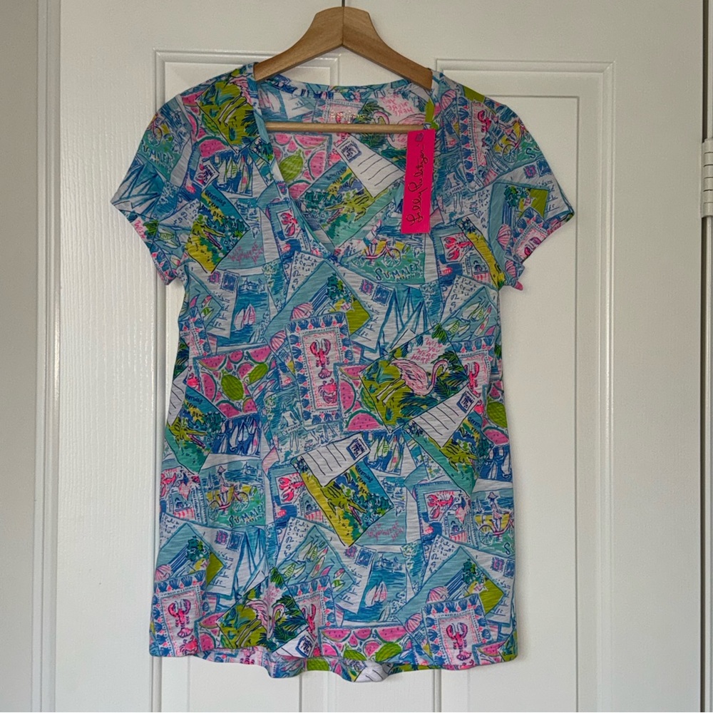 SOLD- Lilly Pulitzer Etta V Neck Short Sleeve T Shirt Wish You Were Here Print